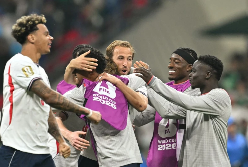 英格蘭隊長凱恩（Harry Kane，中）也有一球進帳。法新社