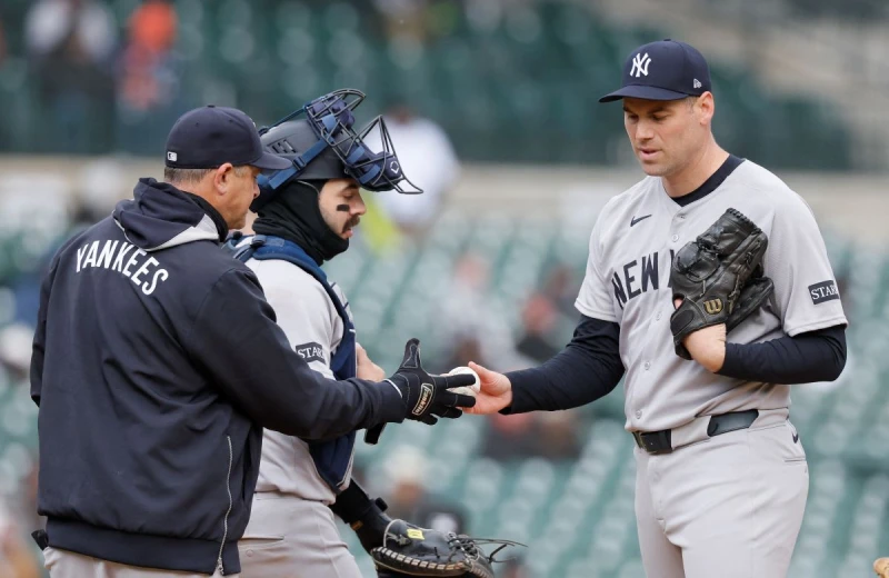 洋基主帥布恩(Aaron Boone,左)。法新社