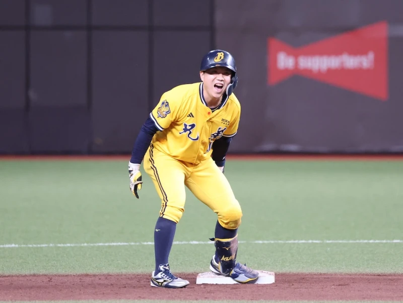 江坤宇助兄弟續命。李天助攝